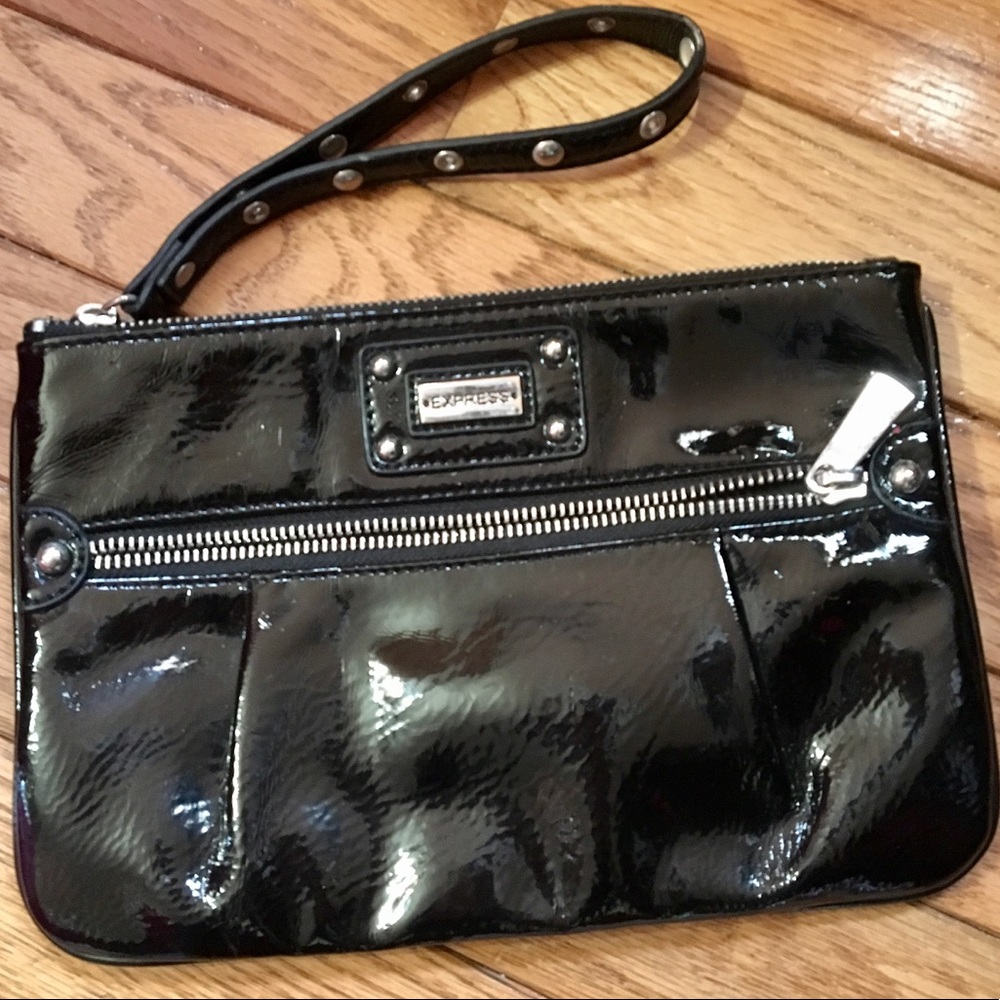 Express Wristlet Patent Leather. Good Condition.